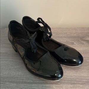 Black Adult Tap Shows with Classic Design and Glossy Finish